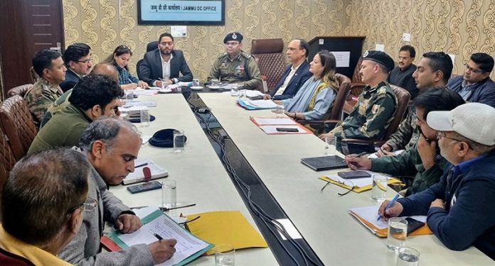 DM and SSP Jammu chairing a meeting on Monday.