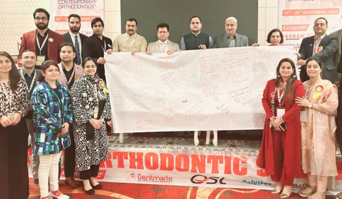 Former Minister Sham Lal Sharma and other dignitaries during valedictory function of 1st J&K Orthodontic Symposium at Jammu.