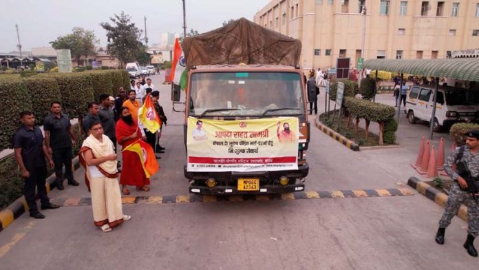 Baba Ramdev and Acharaya Balkrishan flagging off the relief material for the Nepal's earthquake victims on Friday.