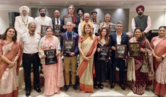 Awardees of Maharaja Hari Singh Dogra Samman Awards posing with guests during a function at Jammu.