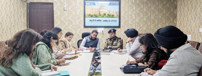 DM and SSP Jammu chairing a meeting on Saturday.