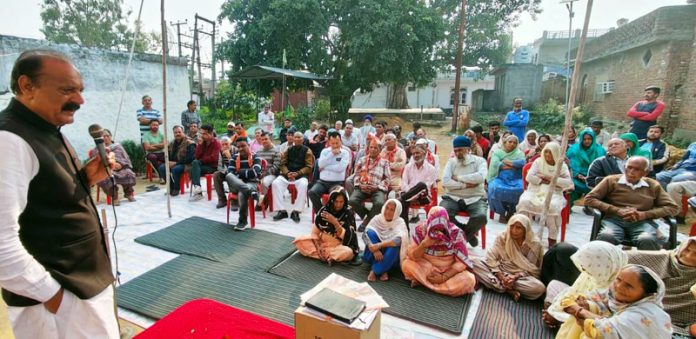 BJP vice president and former Minister Surjit Singh Slathia addressing a meeting at village Trindiya in Ramgarh on Thursday.