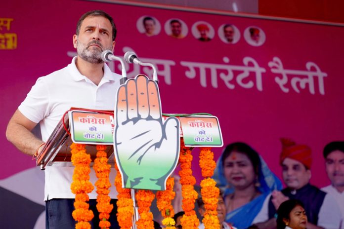 Congress leader Rahul Gandhi addressing an election rally in support of party candidates of Rajasthan Assembly elections, at Rajakhera in Dholpur district on Wednesday. (UNI)