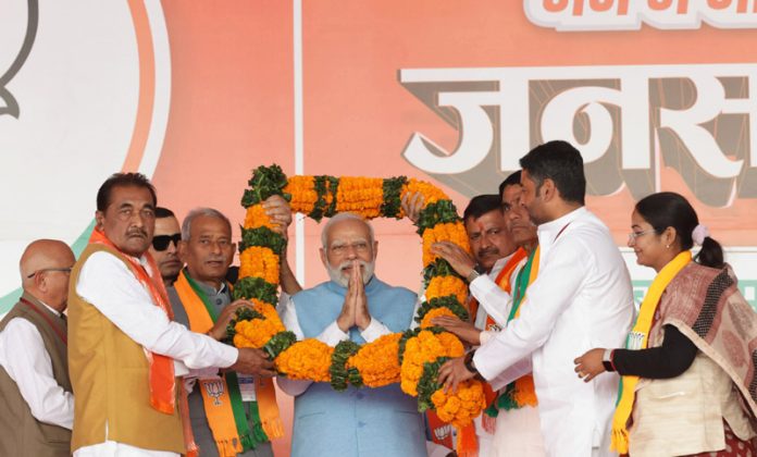 Prime Minister Narendra Modi at a public meeting ahead of Madhya Pradesh elections, in Satna on Thursday. (UNI)