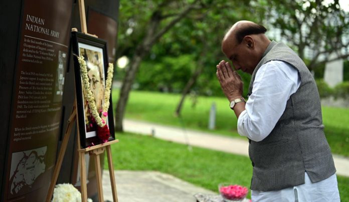 Defence Minister Rajnath Singh paying tributes to Netaji Subhas Chandra Bose by laying a wreath at the Indian National Army marker in Singapore on Saturday. (UNI)