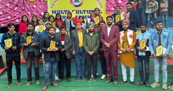 The artists posing with representatives of Pir Panchal and officials of Revenue Department during a cultural event at village Bhatni in Ramban district.