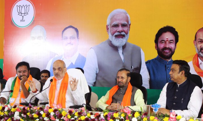 Union Home Minister Amit Shah addressing a Press conference at Hotel Katriya Towers, in Hyderabad on Saturday. (UNI)