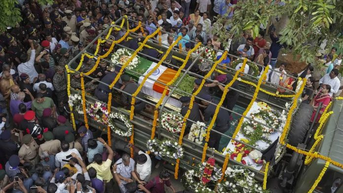 The mortal remains of Captain MV Pranjal, who was killed during an encounter with terrorists in Jammu and Kashmir's Rajouri, being taken in a decorated lorry for last rites, in Bengaluru.