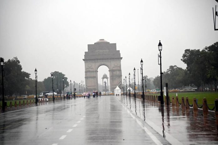 Overnight rain in Delhi and its surrounding areas led to a visible improvement in Delhi's air quality on Friday. (UNI)