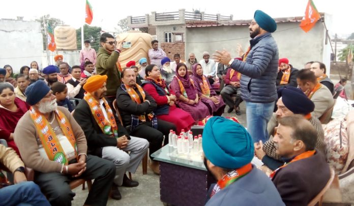 BJP Minority Morcha, president, Ranjodh Singh Nalwa addressing party activists at Kotli Arjun Singh in R S Pura on Monday.