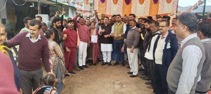 R S Pathania during a party programme at Khoon on Sunday.