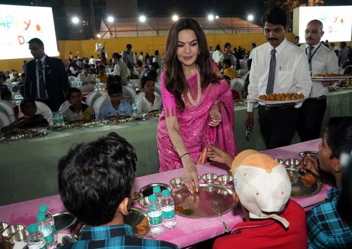 Nita Ambani, Founder Chairperson of Reliance Foundation serves food to over 3000 underprivileged school going children and also gives them gifts on her 60th birthday in Mumbai. She has often stated that children and women are close to her heart.