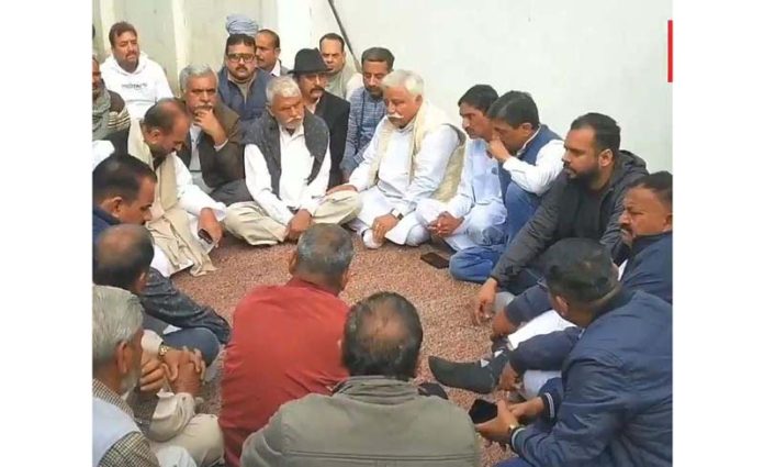 Former Minister and NC additional general secretary, Ajay Kumar Sadhotra paying his condolence to family members of ITBP martyr at his residence in Abtal Katalan in Samba district on Sunday.