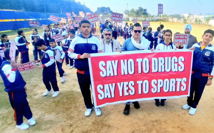 Children of International Daily Rising School during a drug awareness rally in Chowadi area of Jammu.