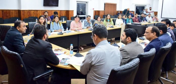 Divisional Commissioner Ramesh Kumar chairing a meeting.