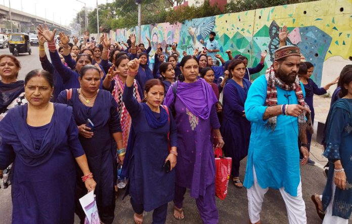 ASHA workers during a protest rally in Jammu on Tuesday.