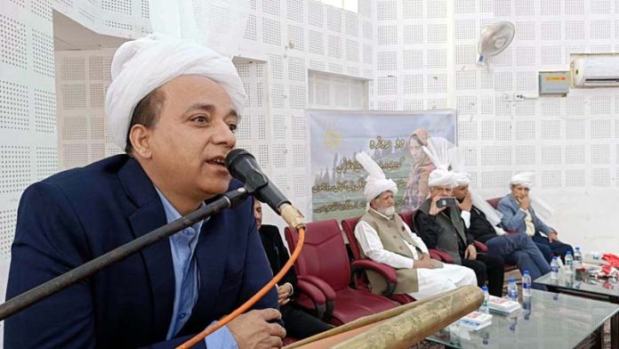 A dignitary addresses during inaugural day of two-day Gojri Writers Conference in Jammu on Tuesday.
