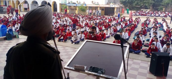 DySP Udhampur Gurmeet Singh addressing students of a school in Udhampur.