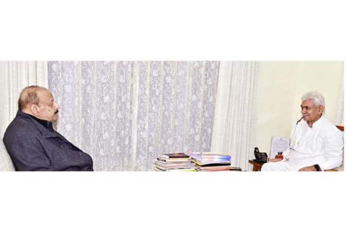 Lt Governor Manoj Sinha meeting Devender Singh Rana, former Legislator on Friday.