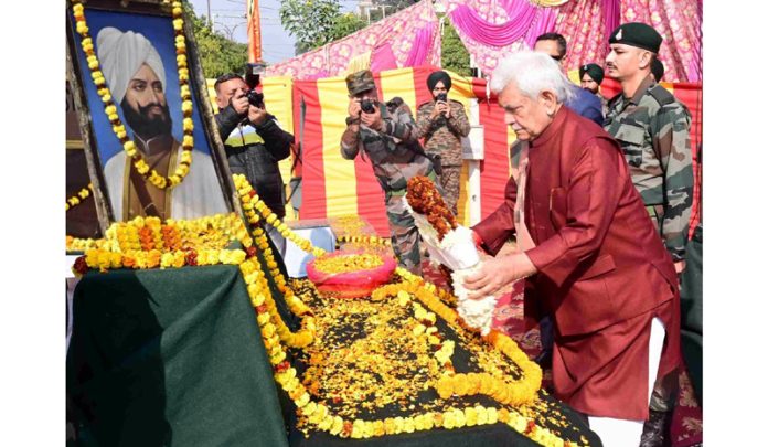 LG Manoj Sinha paying tribute to General Zorawar Singh in Jammu on Tuesday.