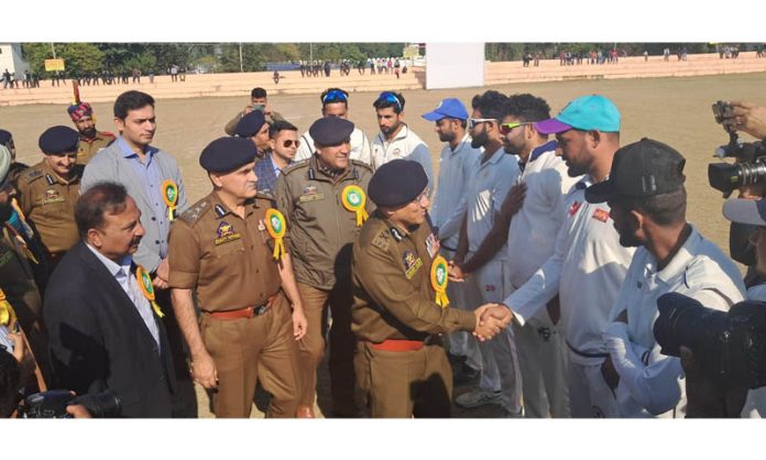 Inspector General of Police, Jammu Zone, Anand Jain interacting with players during 12th Police Martyr's Memorial T-20 Cricket Championship at Kathua.