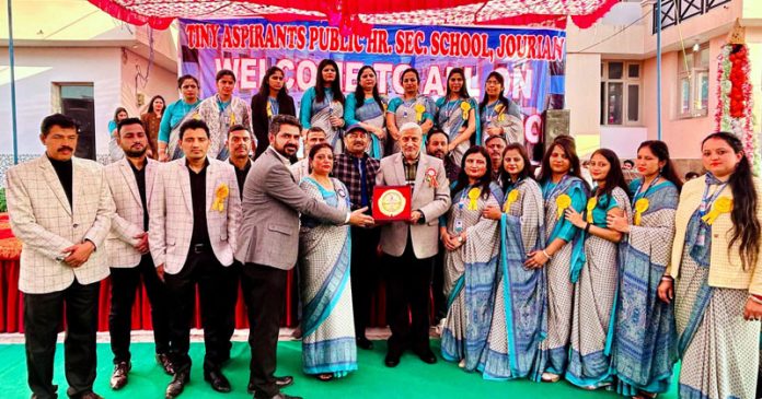 School Management presenting memento to chief guest Sham Lal Sharma, former Minister and State Vice President, BJP during Annual Day.