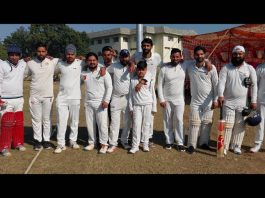 Press Club Jammu-XI team posing for group photograph during an exhibition cricket match at KC Ground in Jammu on Monday.