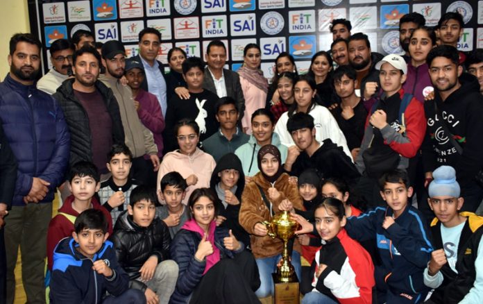 Nuzhat Gull, Secretary J&K Sports Council posing with Wushu athletes in Jammu.
