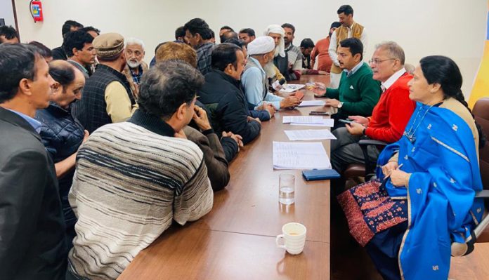 Former Dy CM, Kavinder Gupta and BJP spokesperson, R S Pathania listening public grievances at Jammu on Tuesday.