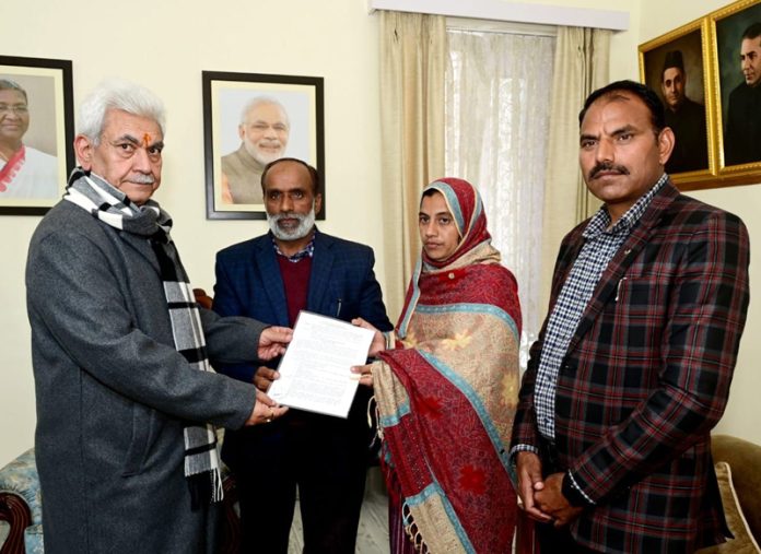 LG hands over appointment letter to wife of martyr Hav Abdul Majid
