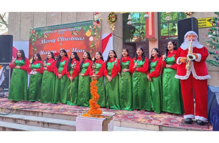 A choir showing musical prowess during Carols Competition at St Mary's Garrison Church in Jammu.