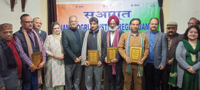 Kavinder Gupta and others with journalists during a function by NDS on Friday. -Excelsior/Rakesh