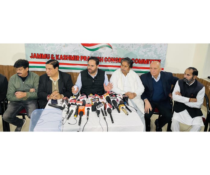 JKPCC president, VR Wani flanked by others addressing press conference in Jammu. - Excelsior/Rakesh