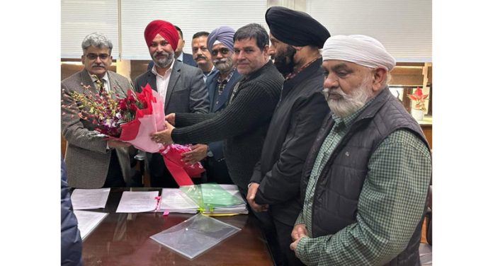 Members of a delegation of SCC and TWA presenting a bouquet to Chief Secretary Atal Dulloo at Civil Secretariat, Jammu.