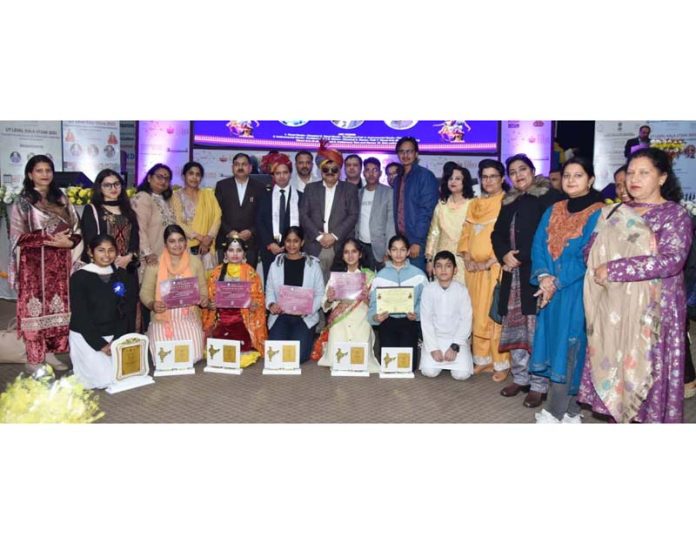 Alok Kumar and others with winners of UT level Kala Utsav at Jammu on Thursday.