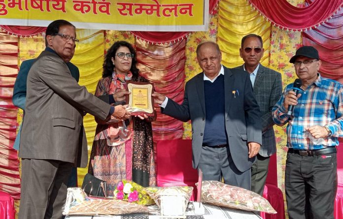 Dr Pragya Khanna, Principal of Girdhari Lal Dogra Memorial GDC, Hiranagar felicitating guests during a function on Sunday.