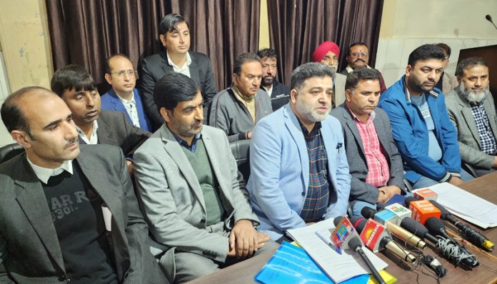 EJAC members led by Wajahat Hussain Durrani talking to media persons after meeting Chief Secy in Jammu on Wednesday. - Excelsior/ Rakesh