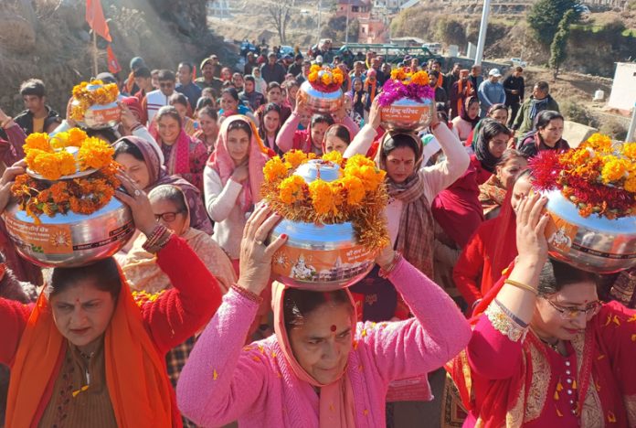 Women carry special pots over their heads during ‘Akshat Kalash Yatra’ in Bhaderwah. -Excelsior/Tilak Raj