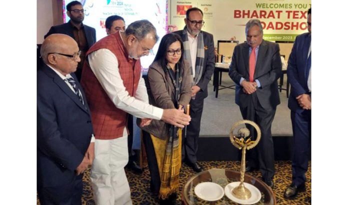 Rohit Kansal, Additional Secretary Textiles along with other dignitaries lighting the traditional lamp during a road show organised by WWEPC at Ludhiana on Wednesday.