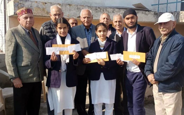 Deaf & dumb students posing with SKK president and other office bearers after receiving cash awards.