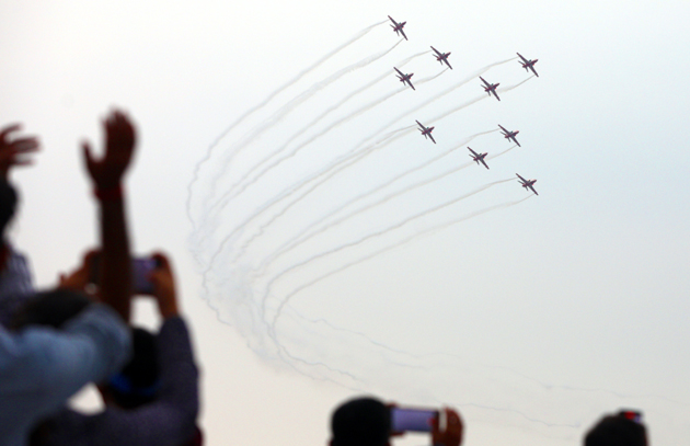 The Indian Air Force (IAF) Surya Kiran aerobatics team performs during an air show in Jammu on Sep 22, 2023. Photo by Rakesh Bakshi