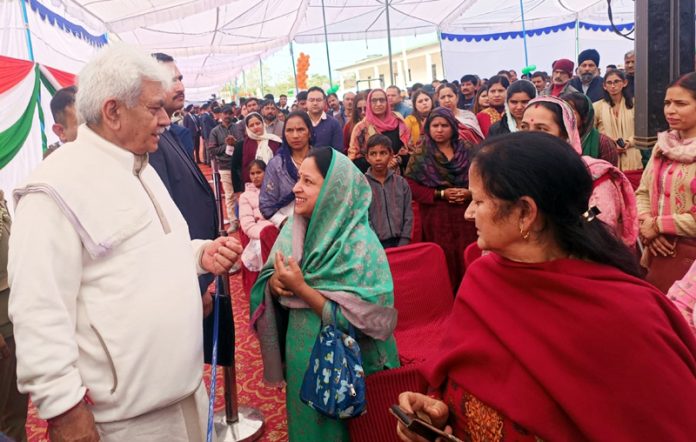 LG Manoj Sinha interacting with a participant during Viksit Bharat Sankalp Yatra at Nagrota on Friday.