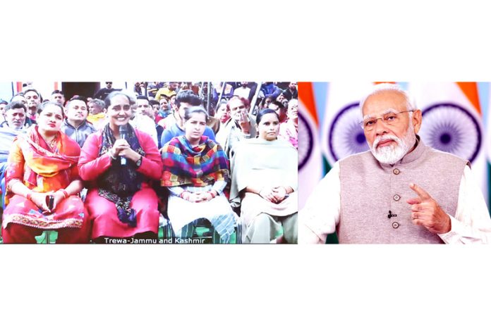 PM Narendra Modi interacting with Sarpanch Balbir Kaur in Arnia border area of Jammu district via video conferencing on Thursday.