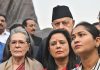 TMC leader Mahua Moitra with Congress leader Sonia Gandhi and others in front of the Gandhi statue after she was expelled from the Lok Sabha in New Delhi on Friday. (UNI)
