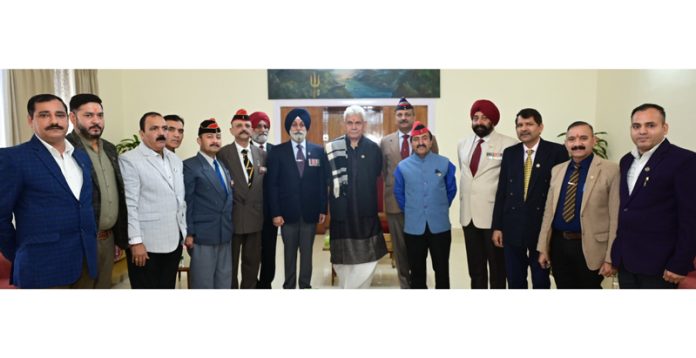 LG Manoj Sinha with Army veterans and Sainik Welfare Department office bearers in Jammu on Saturday.
