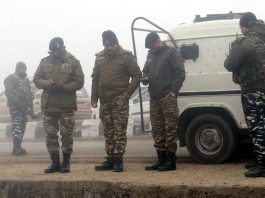 Security forces near Lawaypora on Srinagar-Baramulla highway, where an IED was recovered and subsequently destroyed on Wednesday. -Excelsior/Shakeel