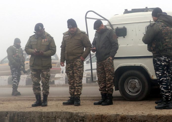 Security forces near Lawaypora on Srinagar-Baramulla highway, where an IED was recovered and subsequently destroyed on Wednesday. -Excelsior/Shakeel