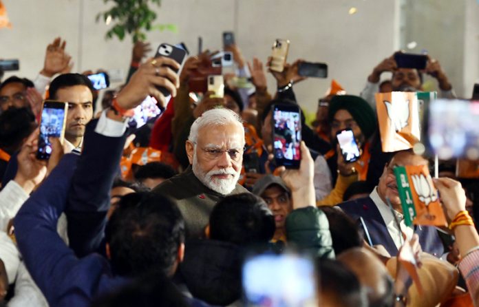 Prime Minister Narendra Modi arrives to attend the celebrations after party's victory in 3 States, at BJP headquarters in New Delhi on Sunday.(UNI)