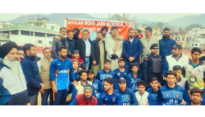 Former CM, Dr. Farooq Abdullah posing for a photograph with others after inaugurating a Cricket Tournament in Poonch on Saturday.