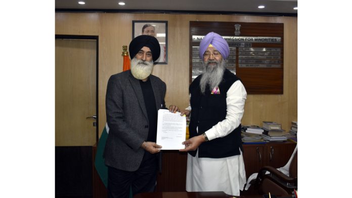 DGPC Jammu vice president Balvinder Singh presenting a memorandum to NCM Chairman Iqbal Singh Lalpura at latter’ office in New Delhi.